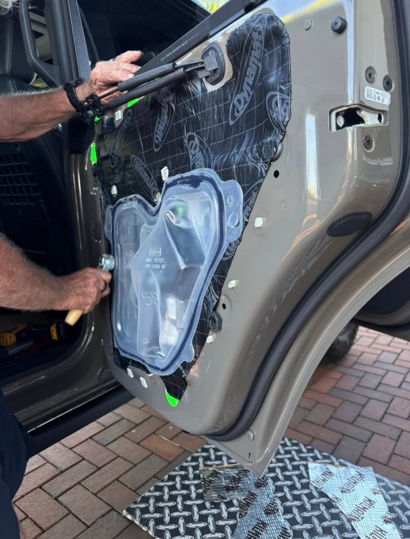 Dynamat sound deadening door installation